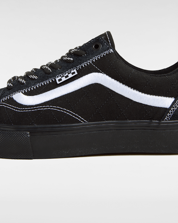 all black vans white stripe