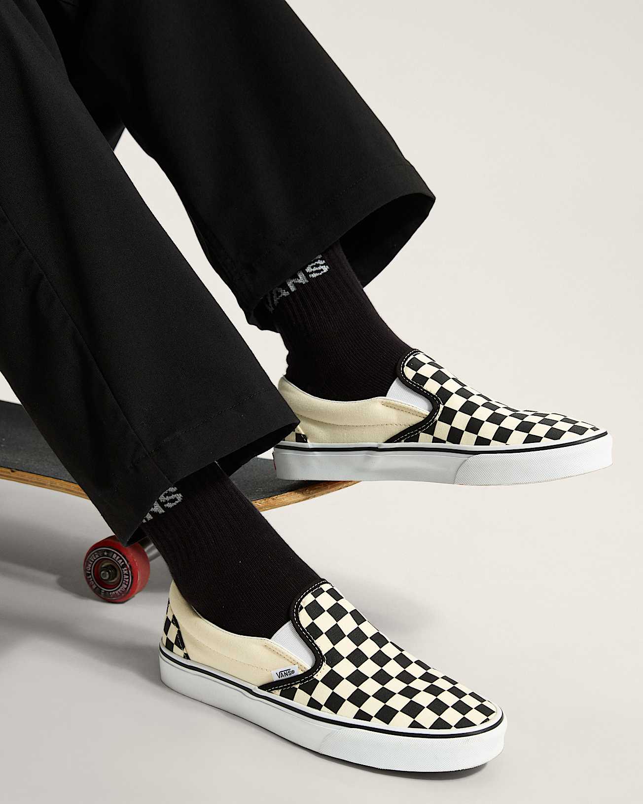 Checkerboard Classic Slip-On Shoes in Black/White| Vans SE